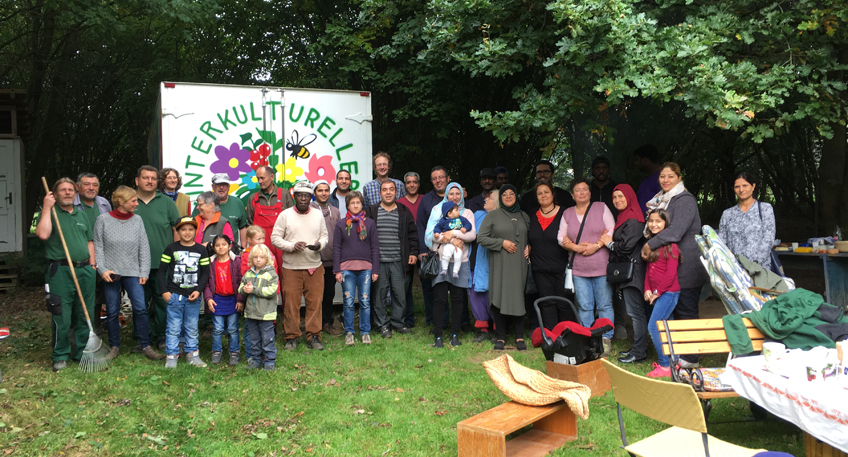 Garten in B&auml;renk&auml;mpen ist Treffpunkt f&uuml;r Menschen vieler Nationen